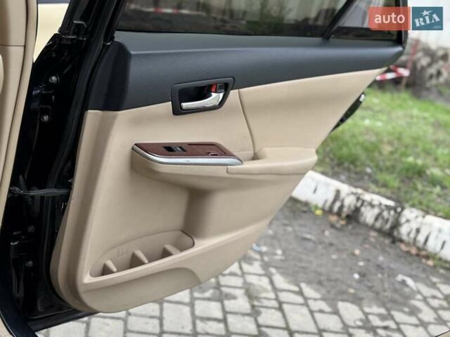 Черный Тойота Камри, объемом двигателя 2.49 л и пробегом 200 тыс. км за 10000 $, фото 52 на Automoto.ua