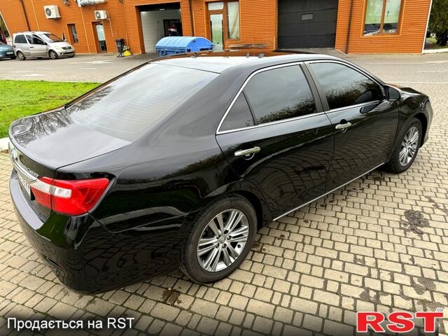 Черный Тойота Камри, объемом двигателя 2.5 л и пробегом 200 тыс. км за 9900 $, фото 4 на Automoto.ua