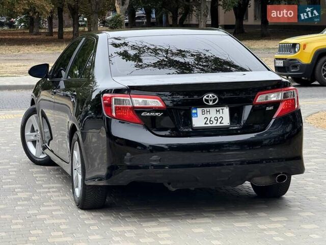 Черный Тойота Камри, объемом двигателя 2.5 л и пробегом 196 тыс. км за 13600 $, фото 29 на Automoto.ua