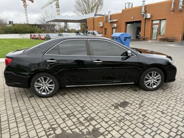 Черный Тойота Камри, объемом двигателя 2.5 л и пробегом 200 тыс. км за 9900 $, фото 3 на Automoto.ua