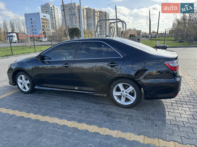 Черный Тойота Камри, объемом двигателя 2.49 л и пробегом 142 тыс. км за 13200 $, фото 12 на Automoto.ua