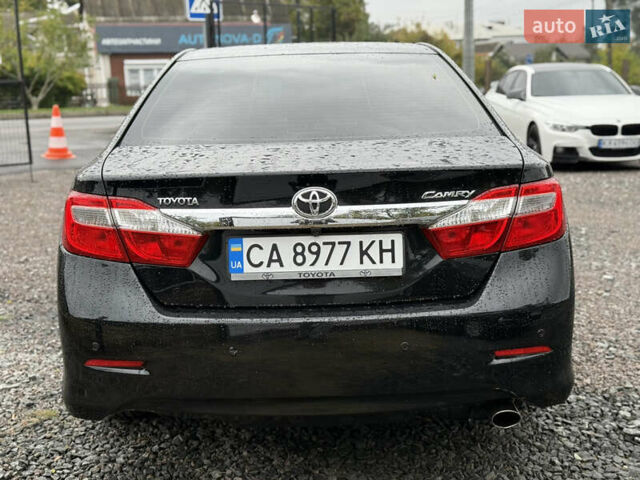 Тойота Камри 2013 в Умани на Automoto.ua Черный Тойота Камри, объемом двигателя 2.5 л и пробегом 244 тыс. км за 12450 $, фото 3 на Automoto.ua