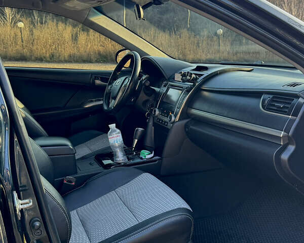 Черный Тойота Камри, объемом двигателя 2.49 л и пробегом 315 тыс. км за 12500 $, фото 4 на Automoto.ua