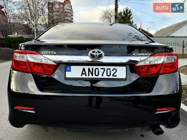 Чорний Тойота Камрі, об'ємом двигуна 2.49 л та пробігом 185 тис. км за 12000 $, фото 11 на Automoto.ua