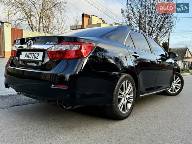 Чорний Тойота Камрі, об'ємом двигуна 2.49 л та пробігом 185 тис. км за 12000 $, фото 21 на Automoto.ua