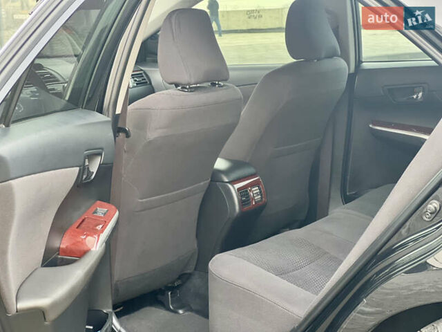 Черный Тойота Камри, объемом двигателя 2.49 л и пробегом 175 тыс. км за 12800 $, фото 30 на Automoto.ua