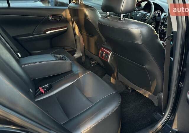 Черный Тойота Камри, объемом двигателя 2.5 л и пробегом 235 тыс. км за 16500 $, фото 18 на Automoto.ua