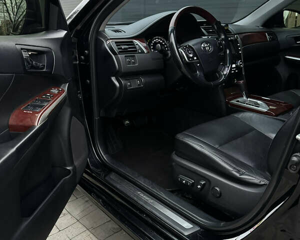 Черный Тойота Камри, объемом двигателя 2.49 л и пробегом 193 тыс. км за 15300 $, фото 12 на Automoto.ua