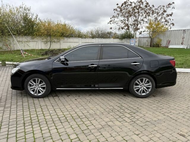 Черный Тойота Камри, объемом двигателя 2.5 л и пробегом 200 тыс. км за 9900 $, фото 2 на Automoto.ua