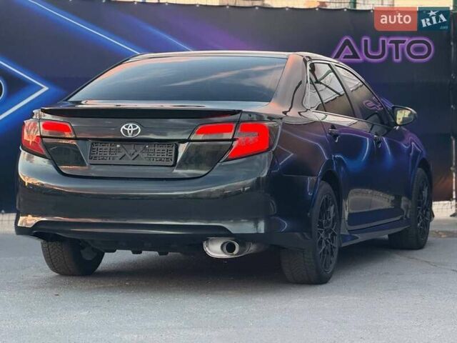 Тойота Камри 2013 в Запорожье на Automoto.ua Черный Тойота Камри, объемом двигателя 2.49 л и пробегом 184 тыс. км за 12499 $, фото 6 на Automoto.ua