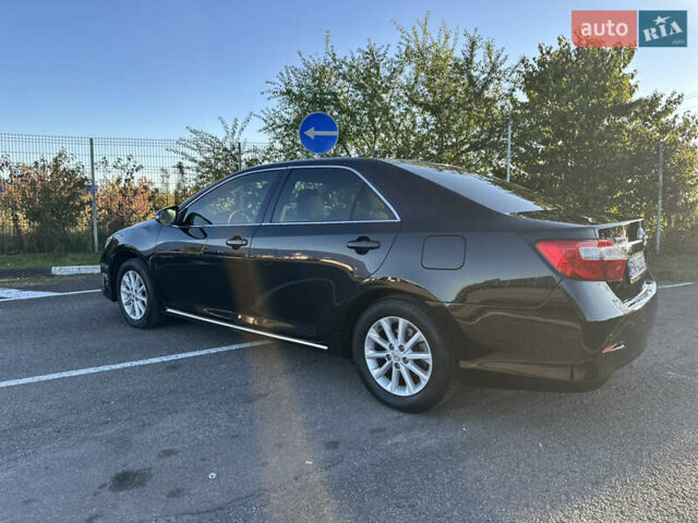 Чорний Тойота Камрі, об'ємом двигуна 2.5 л та пробігом 188 тис. км за 12900 $, фото 23 на Automoto.ua