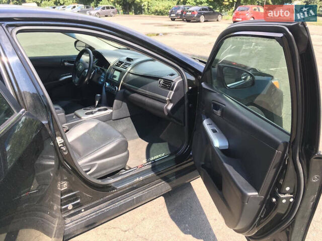 Черный Тойота Камри, объемом двигателя 2.5 л и пробегом 280 тыс. км за 12500 $, фото 4 на Automoto.ua