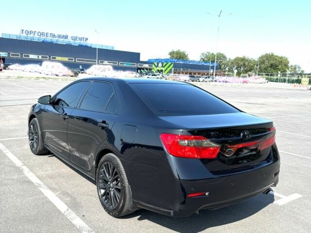 Черный Тойота Камри, объемом двигателя 2.5 л и пробегом 244 тыс. км за 14500 $, фото 4 на Automoto.ua