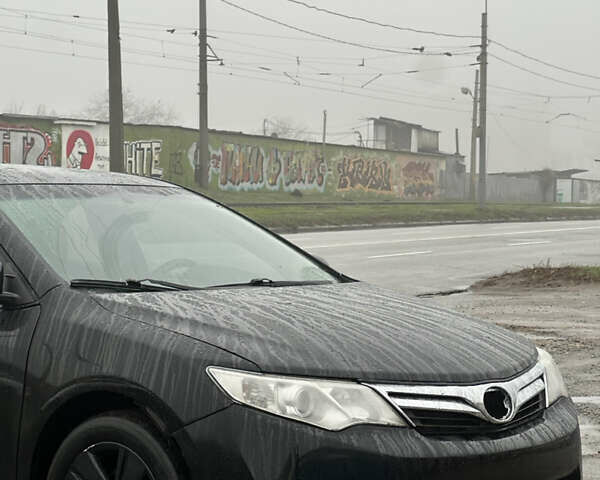 Черный Тойота Камри, объемом двигателя 2.49 л и пробегом 220 тыс. км за 7599 $, фото 3 на Automoto.ua