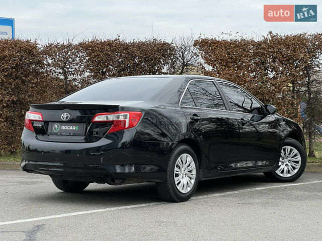 Чорний Тойота Камрі, об'ємом двигуна 2.49 л та пробігом 199 тис. км за 10999 $, фото 22 на Automoto.ua