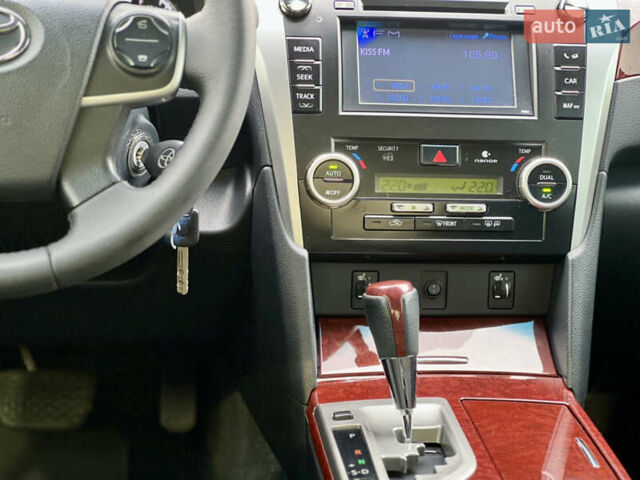 Черный Тойота Камри, объемом двигателя 2.49 л и пробегом 175 тыс. км за 12800 $, фото 24 на Automoto.ua