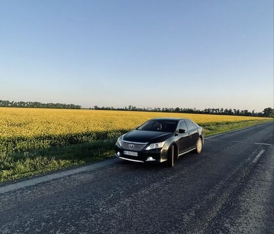 Черный Тойота Камри, объемом двигателя 2.5 л и пробегом 280 тыс. км за 12100 $, фото 16 на Automoto.ua