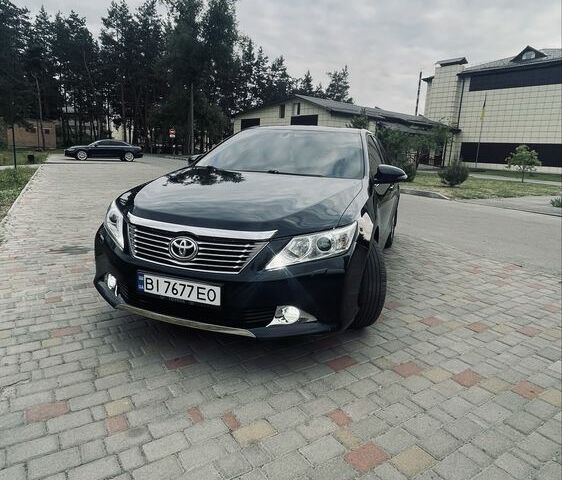 Черный Тойота Камри, объемом двигателя 2.5 л и пробегом 280 тыс. км за 12100 $, фото 12 на Automoto.ua