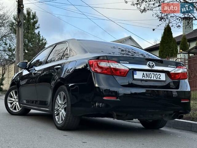 Чорний Тойота Камрі, об'ємом двигуна 2.49 л та пробігом 185 тис. км за 12000 $, фото 13 на Automoto.ua