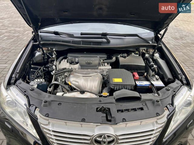 Черный Тойота Камри, объемом двигателя 2.49 л и пробегом 175 тыс. км за 12800 $, фото 31 на Automoto.ua