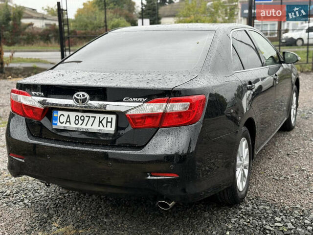 Тойота Камри 2013 в Умани на Automoto.ua Черный Тойота Камри, объемом двигателя 2.5 л и пробегом 244 тыс. км за 12450 $, фото 5 на Automoto.ua