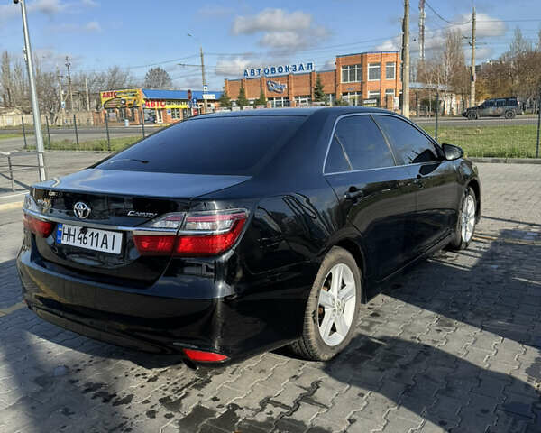 Черный Тойота Камри, объемом двигателя 2.49 л и пробегом 142 тыс. км за 13200 $, фото 4 на Automoto.ua