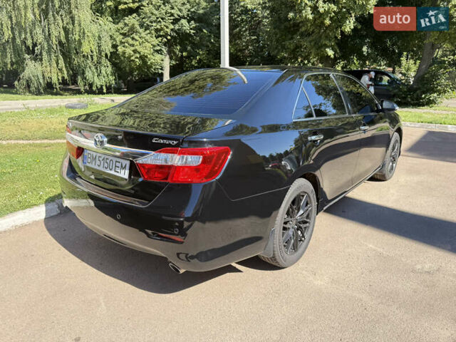 Черный Тойота Камри, объемом двигателя 2.49 л и пробегом 164 тыс. км за 14000 $, фото 3 на Automoto.ua