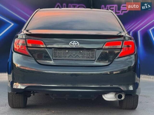 Тойота Камри 2013 в Запорожье на Automoto.ua Черный Тойота Камри, объемом двигателя 2.49 л и пробегом 184 тыс. км за 12499 $, фото 5 на Automoto.ua