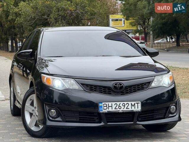 Черный Тойота Камри, объемом двигателя 2.5 л и пробегом 196 тыс. км за 13600 $, фото 22 на Automoto.ua