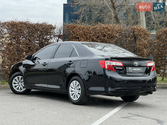 Чорний Тойота Камрі, об'ємом двигуна 2.49 л та пробігом 199 тис. км за 10999 $, фото 18 на Automoto.ua