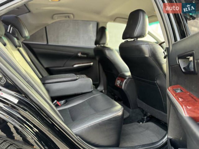 Чорний Тойота Камрі, об'ємом двигуна 2.5 л та пробігом 208 тис. км за 13700 $, фото 23 на Automoto.ua