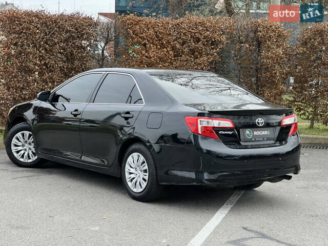 Чорний Тойота Камрі, об'ємом двигуна 2.49 л та пробігом 199 тис. км за 10999 $, фото 17 на Automoto.ua