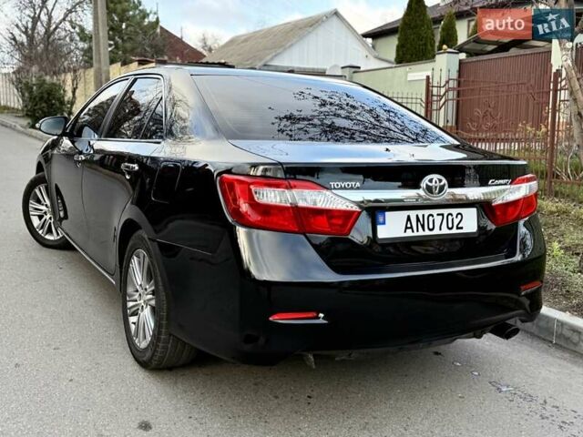 Чорний Тойота Камрі, об'ємом двигуна 2.49 л та пробігом 185 тис. км за 12000 $, фото 9 на Automoto.ua