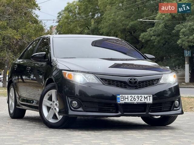 Черный Тойота Камри, объемом двигателя 2.5 л и пробегом 196 тыс. км за 13600 $, фото 27 на Automoto.ua