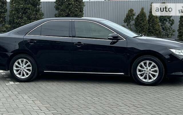 Черный Тойота Камри, объемом двигателя 2.5 л и пробегом 150 тыс. км за 14250 $, фото 5 на Automoto.ua