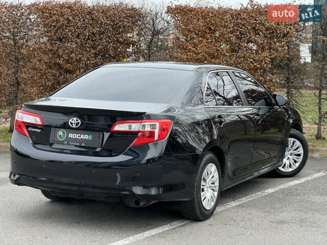 Чорний Тойота Камрі, об'ємом двигуна 2.49 л та пробігом 199 тис. км за 10999 $, фото 19 на Automoto.ua