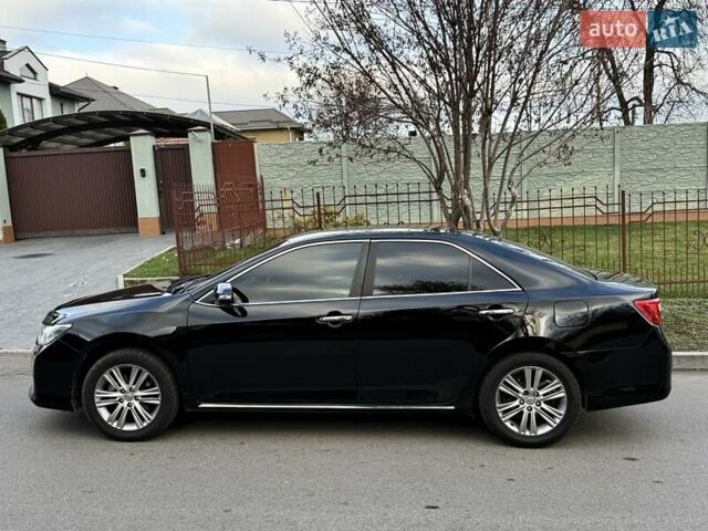 Чорний Тойота Камрі, об'ємом двигуна 2.49 л та пробігом 185 тис. км за 12000 $, фото 6 на Automoto.ua