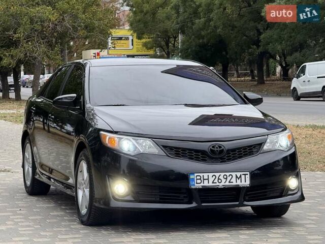 Черный Тойота Камри, объемом двигателя 2.5 л и пробегом 196 тыс. км за 13600 $, фото 3 на Automoto.ua