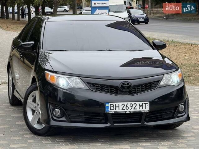 Черный Тойота Камри, объемом двигателя 2.5 л и пробегом 196 тыс. км за 13600 $, фото 25 на Automoto.ua