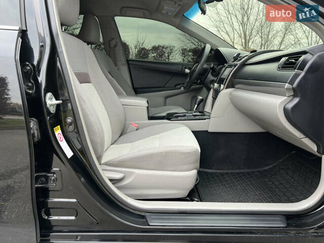 Чорний Тойота Камрі, об'ємом двигуна 2.49 л та пробігом 199 тис. км за 10999 $, фото 49 на Automoto.ua