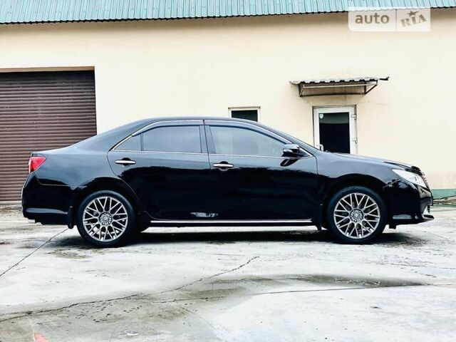 Черный Тойота Камри, объемом двигателя 2.5 л и пробегом 200 тыс. км за 15999 $, фото 12 на Automoto.ua