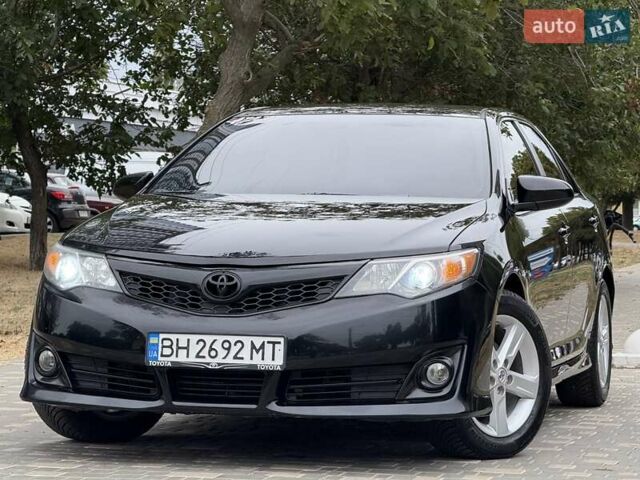 Черный Тойота Камри, объемом двигателя 2.5 л и пробегом 196 тыс. км за 13600 $, фото 12 на Automoto.ua