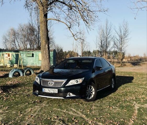 Черный Тойота Камри, объемом двигателя 2.5 л и пробегом 280 тыс. км за 12100 $, фото 13 на Automoto.ua