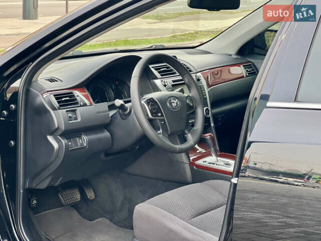 Черный Тойота Камри, объемом двигателя 2.49 л и пробегом 175 тыс. км за 12800 $, фото 28 на Automoto.ua