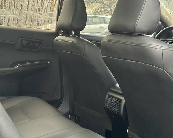 Черный Тойота Камри, объемом двигателя 2.49 л и пробегом 220 тыс. км за 7599 $, фото 4 на Automoto.ua