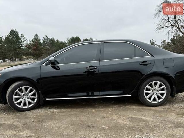 Чорний Тойота Камрі, об'ємом двигуна 2.5 л та пробігом 153 тис. км за 12800 $, фото 5 на Automoto.ua