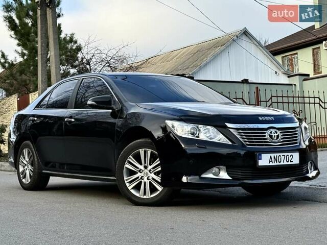 Чорний Тойота Камрі, об'ємом двигуна 2.49 л та пробігом 185 тис. км за 12000 $, фото 17 на Automoto.ua