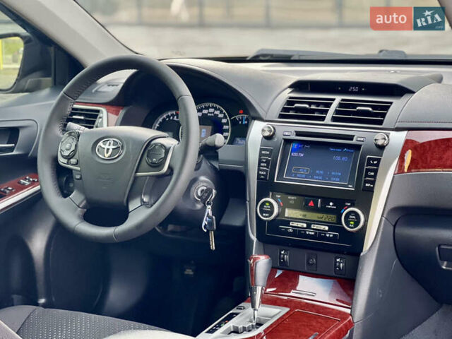 Черный Тойота Камри, объемом двигателя 2.49 л и пробегом 175 тыс. км за 12800 $, фото 19 на Automoto.ua