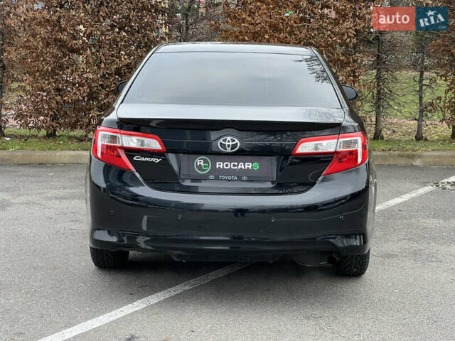 Чорний Тойота Камрі, об'ємом двигуна 2.49 л та пробігом 199 тис. км за 10999 $, фото 13 на Automoto.ua