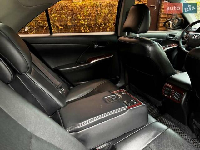 Черный Тойота Камри, объемом двигателя 2.5 л и пробегом 257 тыс. км за 13990 $, фото 32 на Automoto.ua